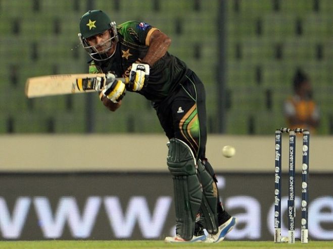 Mohammad Hafeez plays a shot during the warm up.