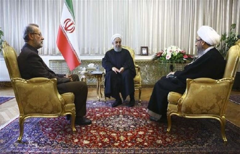 Iranian President Hassan Rouhani (C) meets with heads of the Iranian Parliament and Judiciary, Ali Larijani (L) and Ayatollah Sadeq Amoli Larijani