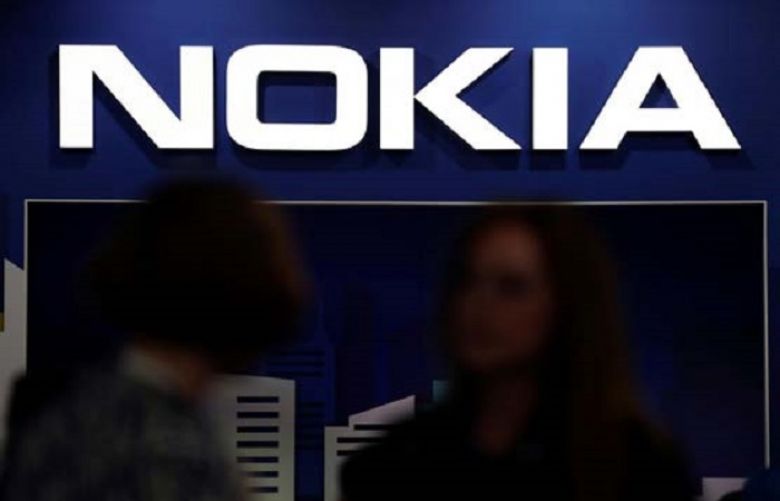 Visitors gather outside the Nokia booth at the Mobile World Congress
