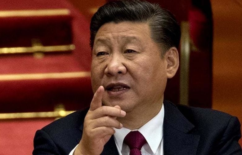 Xi tightens grip on China as Communist Party adds his name, ideology to constitution