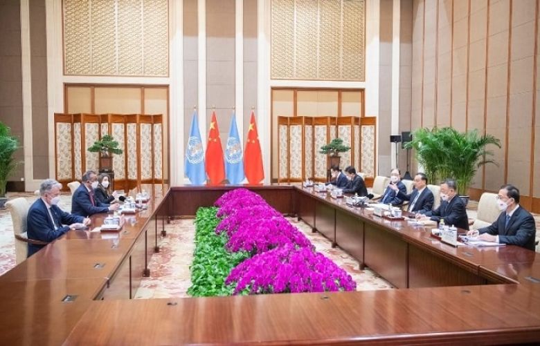 WHO chief, Chinese premier hold Covid talks