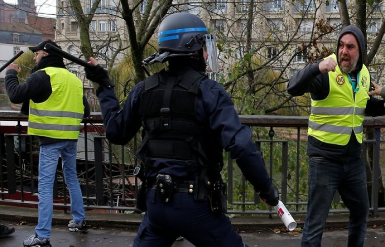 Confrontation between police and protesters during &#039;yellow vest&#039; protest in Strasbourg on December 1, 2018. 