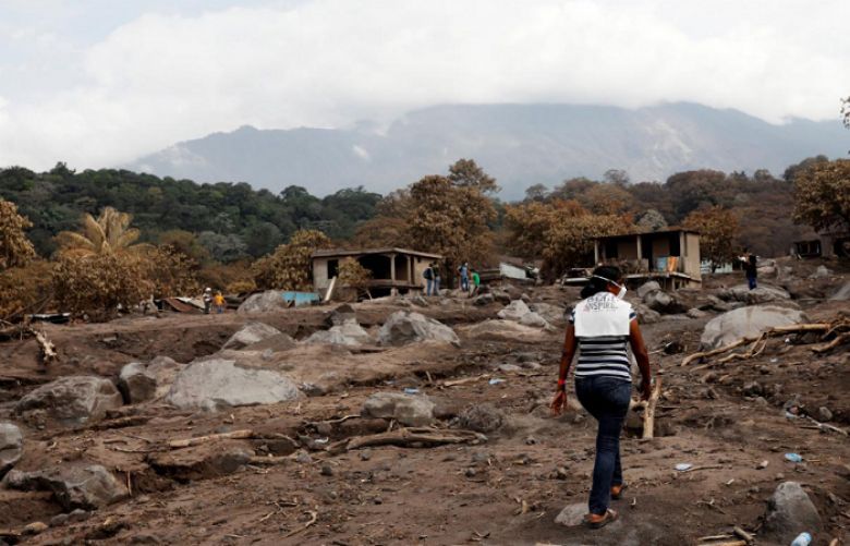In Guatemala, woman searches for 50 relatives buried by volcano