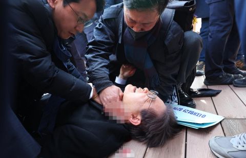 South Korean opposition leader stabbed in neck, airlifted to hospital
