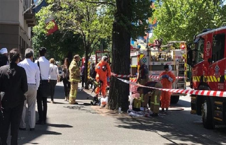 Emergency personnel are seen outside the Indian and French consulates in Melbourne, Australia, on January 9, 2019.