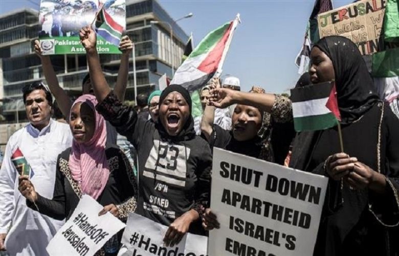 Pro-Palestine demonstrators chant slogans outside the US Consulate General in Sandton, Johannesburg, South Africa, December 14, 2017.