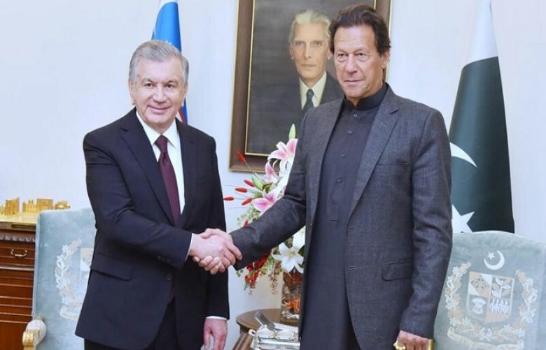 PM Imran alongside Uzbekistan president