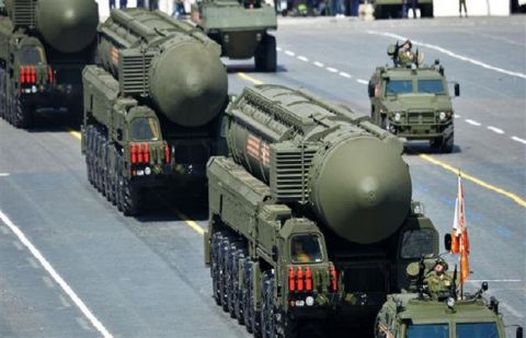 Russian Yars RS-24 intercontinental ballistic missiles systems drive during the Victory Day military parade in Moscow on May 9, 2015.