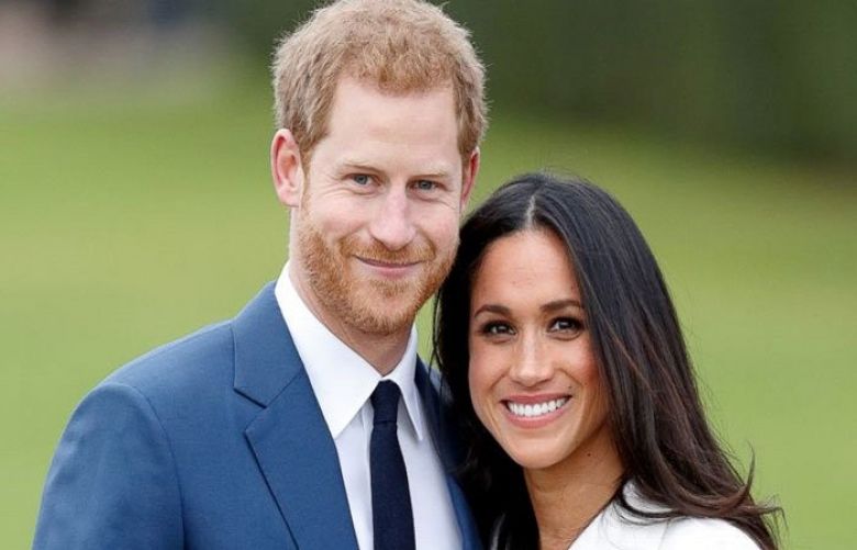 Britain’s Prince Harry and his wife Meghan
