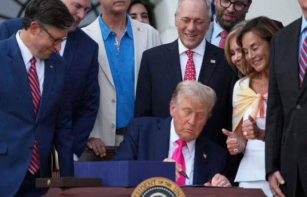 Trump signs sweeping tax cuts into law, calling it a victory for Americans