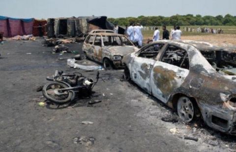 Burnt out cars and motorcycles are seen at the scene of an oil tanker explosion in Bahawalpur, Pakistan June 25, 2017.