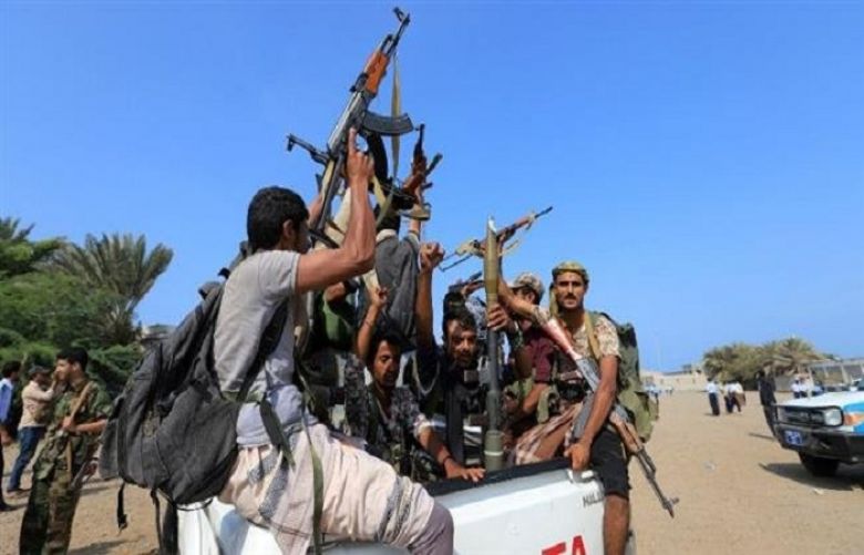 Houthi fighters ride on the back of a truck as they withdraw, as part of a UN-sponsored peace agreement signed in Sweden earlier this month, from the Red Sea city of Hudaydah, Yemen December 29, 2018. 