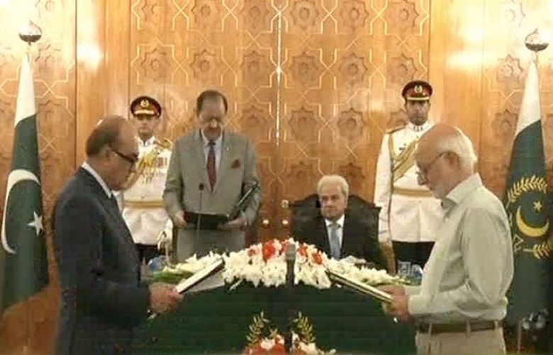 Two new caretaker federal ministers take oath