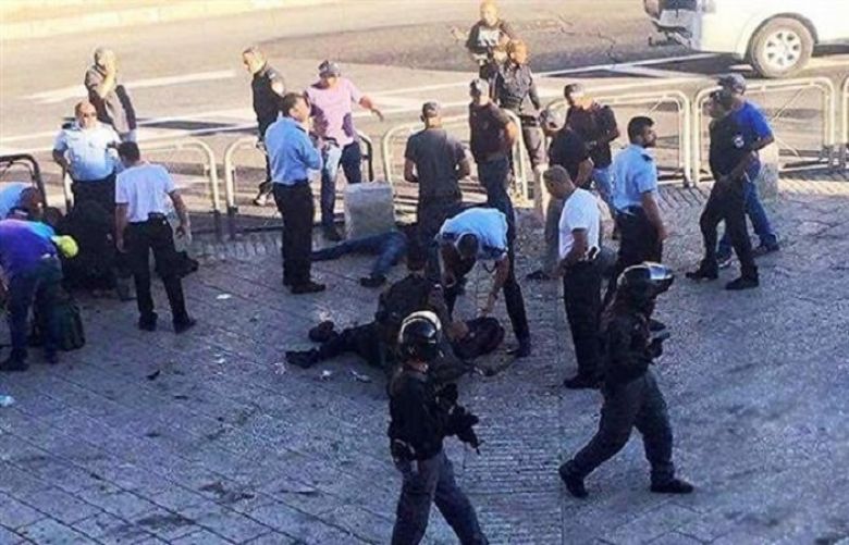 Israeli forces shoot Palestinian youth over alleged stabbing attack