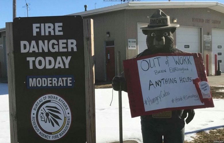 Sign posted outside of the Bureau of Indian Affairs Wildland Fire Management offices on the Rosebud Reservation, S.D., protesting government shutdown. Courtesy Lynne Columbe