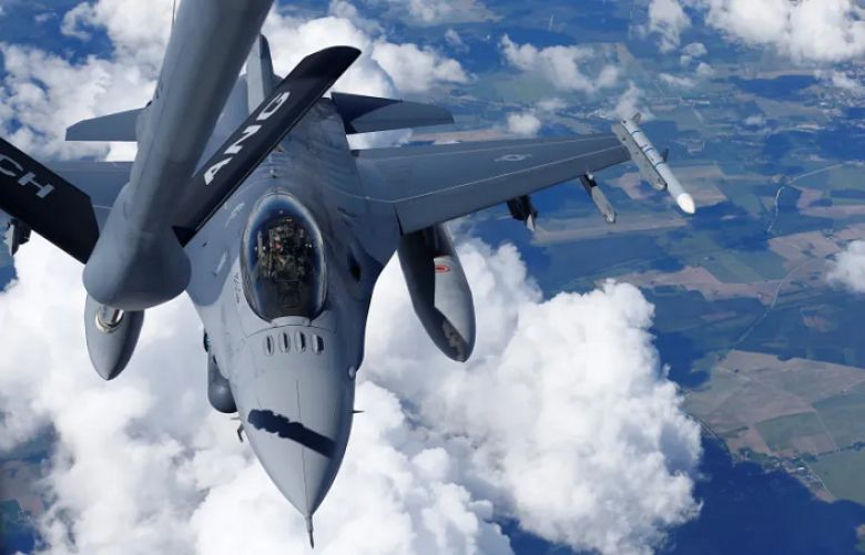 A US Air Force F-16 fighter prepares for mid-air refuelling