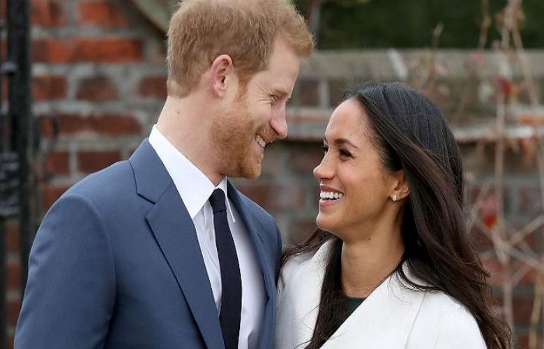  Prince Harry and his wife Meghan Markle