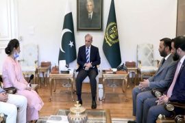 PM Shehbaz presents Rs10 million cheque to brave PIMS nurse