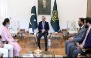PM Shehbaz presents Rs10 million cheque to brave PIMS nurse