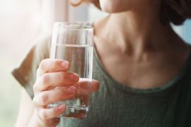 How does warm water improve digestive performance?