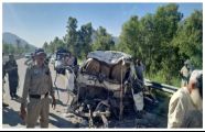 At least 18 killed as passenger coach hits parked bus on Swat Motorway