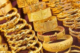 Gold price hits record high in national and international markets