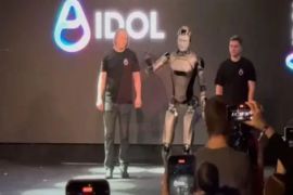 Russian AI robot falls during public unveiling